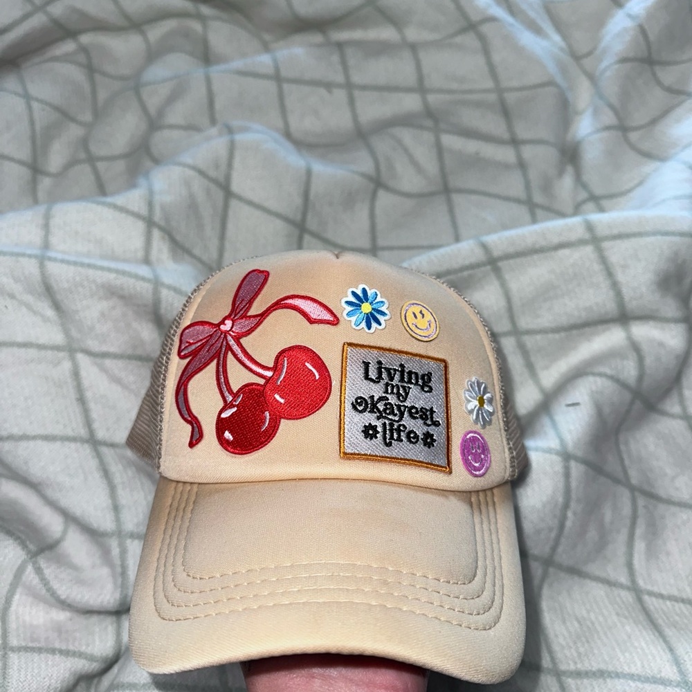 Beige Cap with Cherry and Patch Design